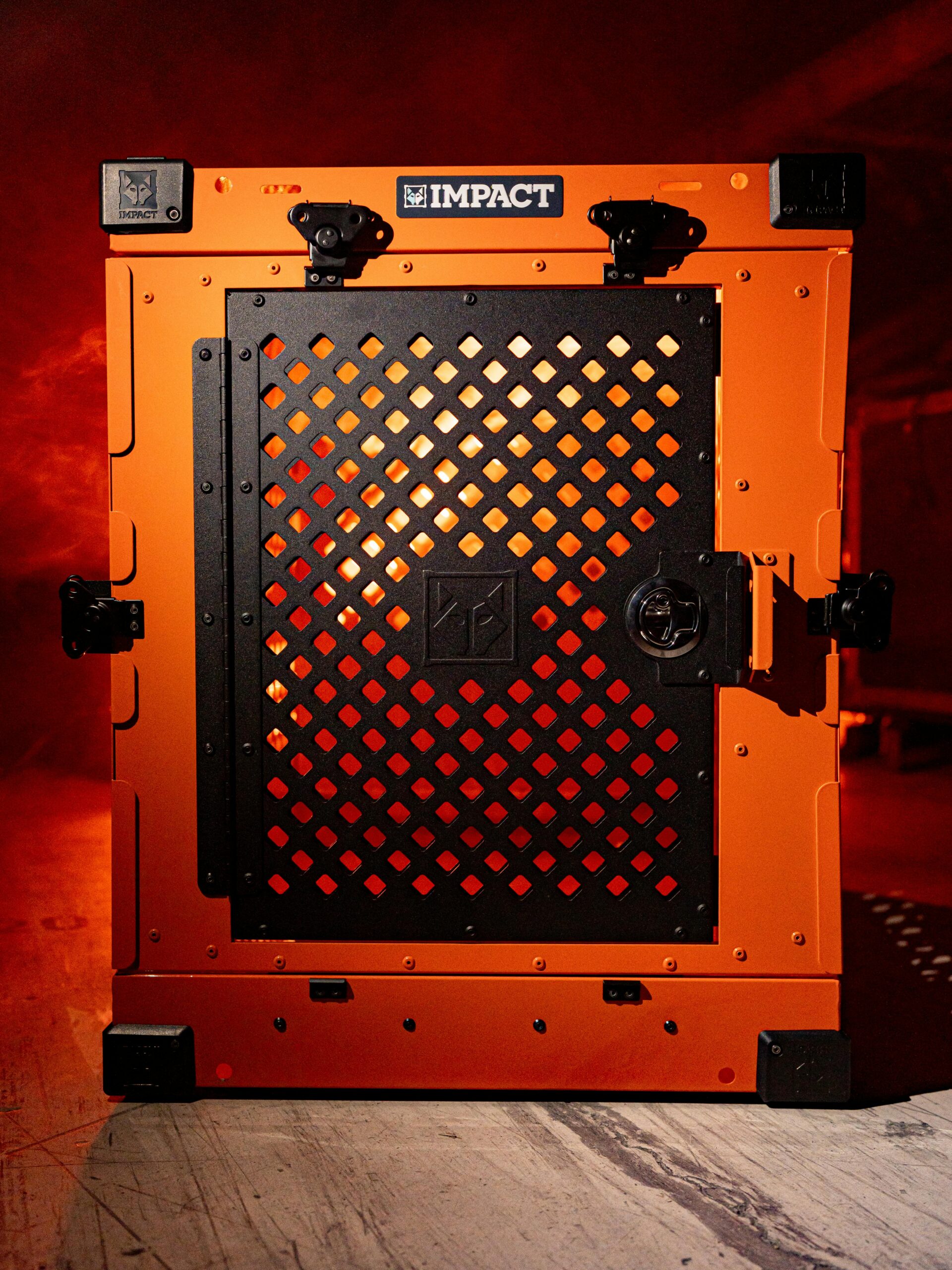Sturdy orange and black dog crate designed for pet safety and durability. Ideal for home lifestyles.